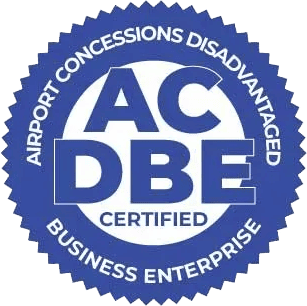 Blue circular seal with the text ACDBE Certified in the center. Around the edge, it reads Airport Concessions Disadvantaged Business Enterprise.